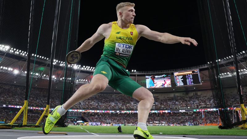 Mykolas Alekna, a Lithuanian discus thrower, shatters the longest standing men’s track and field world record