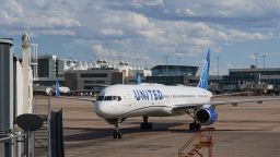 A Boeing 757-300 aircraft, operated by United Airlines, taxis on the runway after landing outside the Jeppesen Terminal at Denver International Airport (DEN) in Denver, Colorado, US, on Saturday, August 19, 2023.
