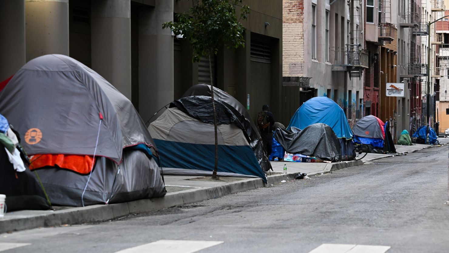 Homeless encampment is seen on a sidewalk in San Francisco in 2023.