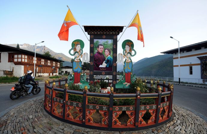 <strong>Royal fame: </strong>Nearly every home or business in Bhutan has a picture of the royal family. Here, the king and queen of Bhutan are pictured. The pair now has three children.