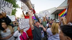 ORANGE, CA - SEPTEMBER 07: Ben Richards, center, founder of SoCal Parents Advocates uses a megaphone to lead protestors in favor of the transgender notification policy outside the Orange Unified School District where the board is meeting to decide if the OUSD will implement a transgender notification policy in Orange on Thursday, September 7, 2023. (Photo by Leonard Ortiz/MediaNews Group/Orange County Register via Getty Images)