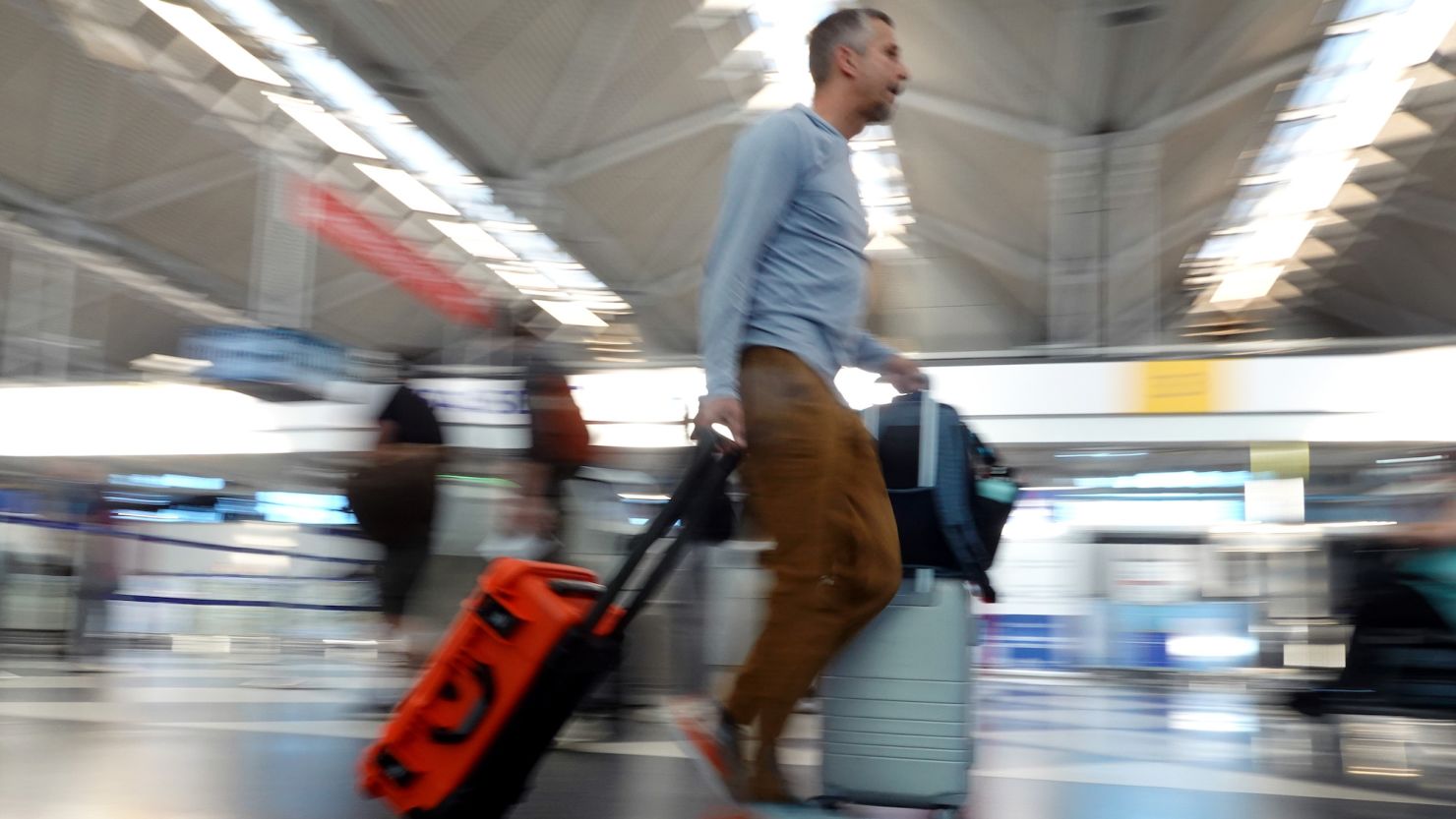 Travelers arrive at O'Hare International Airport in Chicago for Labor Day weekend travel in 2023.