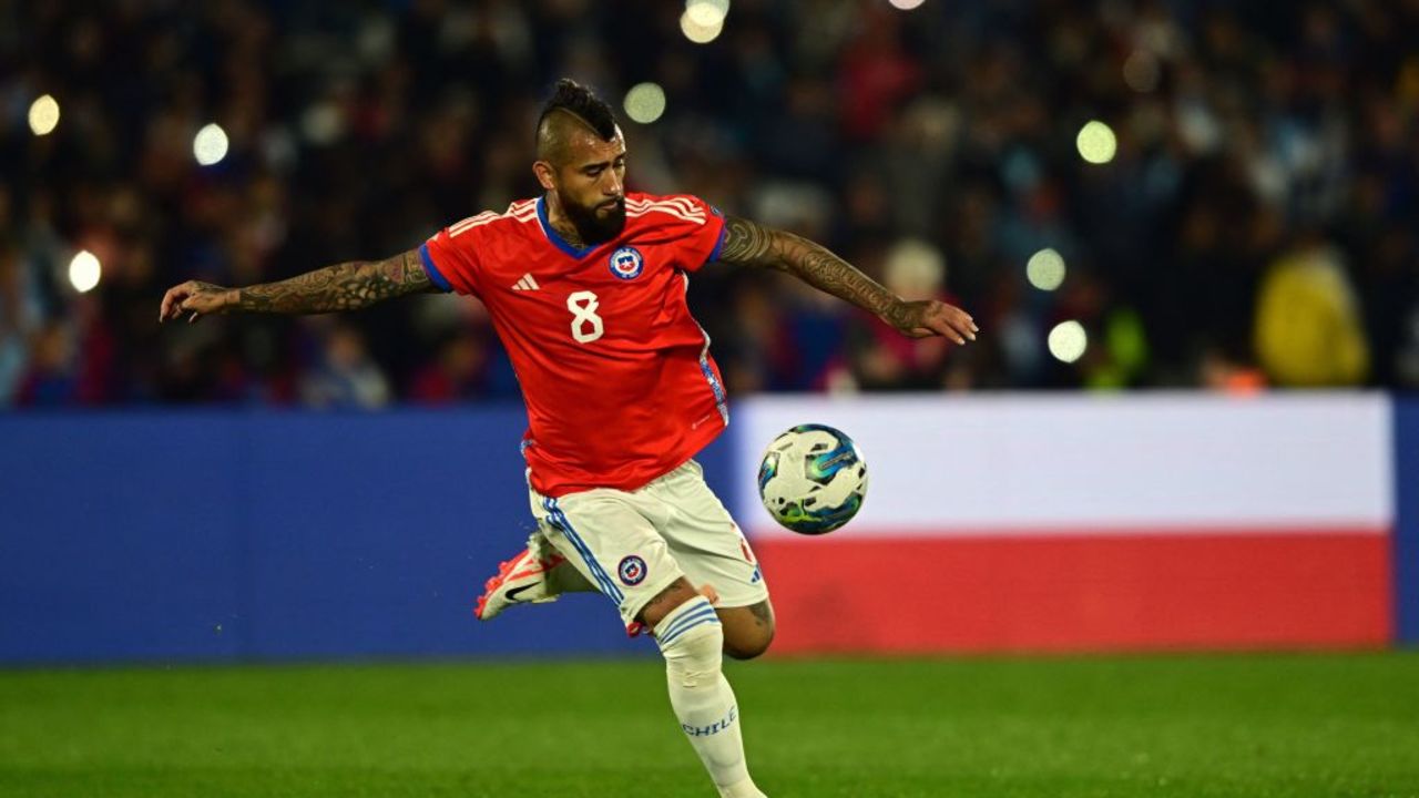 Chile's midfielder Arturo Vidal strikes the ball during the 2026 FIFA World Cup South American qualifiers football match between Uruguay and Chile, at the Centenario stadium in Montevideo, on September 8, 2023. (Photo by Pablo PORCIUNCULA / AFP) (Photo by PABLO PORCIUNCULA/AFP via Getty Images)