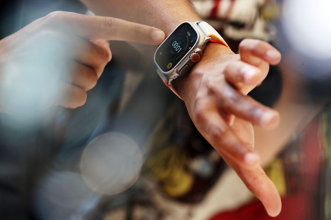 An attendee tries on the new Apple Watch Ultra 2 during an Apple event on September 12, 2023 in Cupertino, California. Apple revealed its lineup of the latest iPhone 15 versions as well as other product upgrades during the event.