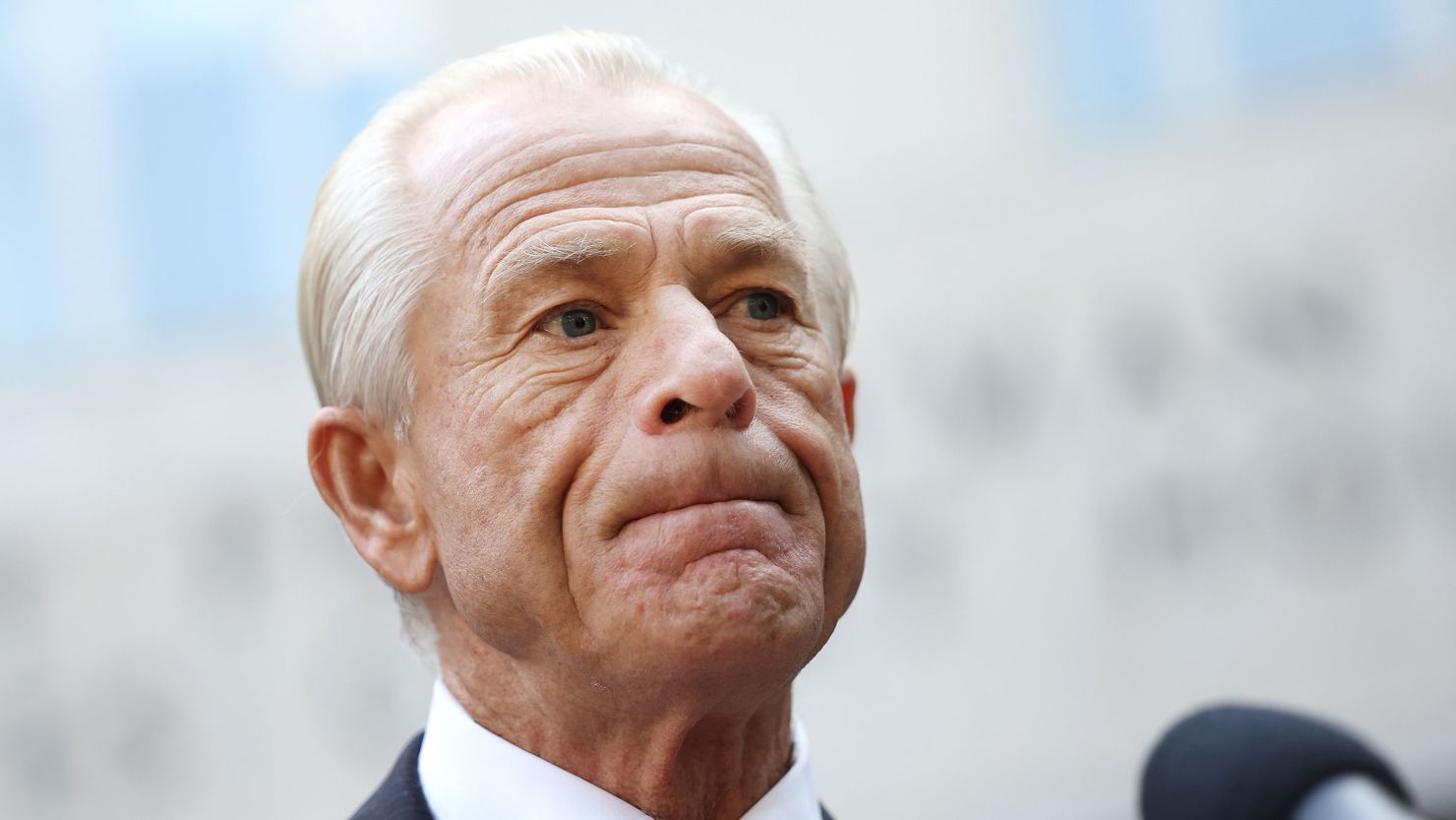 Peter Navarro, an advisor to former President Donald Trump, speaks to reporters as he arrives at the E. Barrett Prettyman Courthouse on September 7, 2023 in Washington, DC.