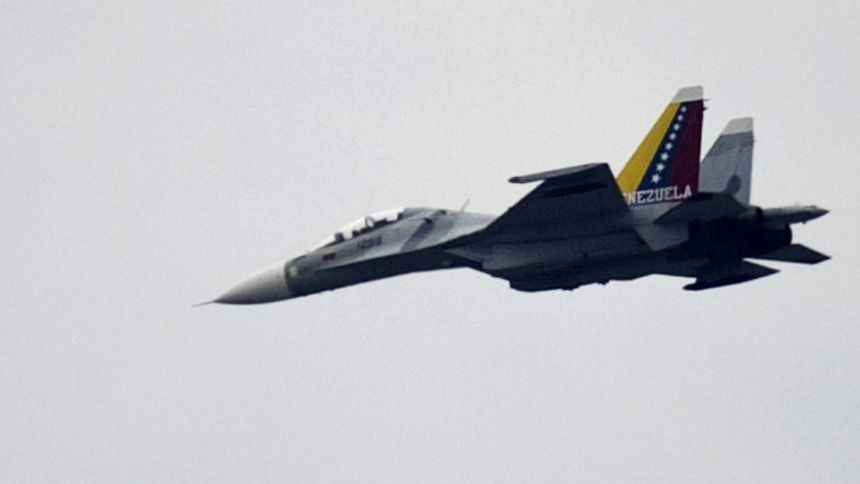 A Russian Sukhoi Su-30 fighter jet of the Venezuelan Air Force flies over Caracas on April 18, 2013.