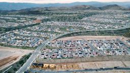 An aerial view of homes in a housing development with new houses under construction on September 08, 2023 in Santa Clarita, California.