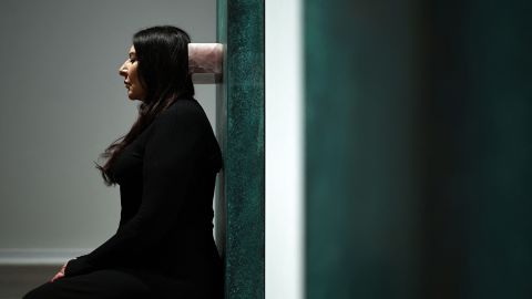 Serbian performance artist Marina Abramovic poses sitting on one of her artworks, entitled 'Red Dragon' during a photocall at the Royal Academy of Arts (RA) in London on September 19, 2023, ahead of an exhibition of her work. The solo exhibition of Abramovic's work is set to run from September 23, 2023 to January 1, 2024. (Photo by HENRY NICHOLLS / AFP) / RESTRICTED TO EDITORIAL USE - MANDATORY MENTION OF THE ARTIST UPON PUBLICATION - TO ILLUSTRATE THE EVENT AS SPECIFIED IN THE CAPTION (Photo by HENRY NICHOLLS/AFP via Getty Images)