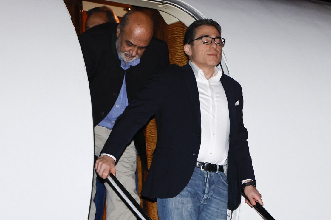 Siamak Namazi pauses on the airplane steps as he and four other Americans freed from detention in Iran arrive in the United States on September 19, 2023.