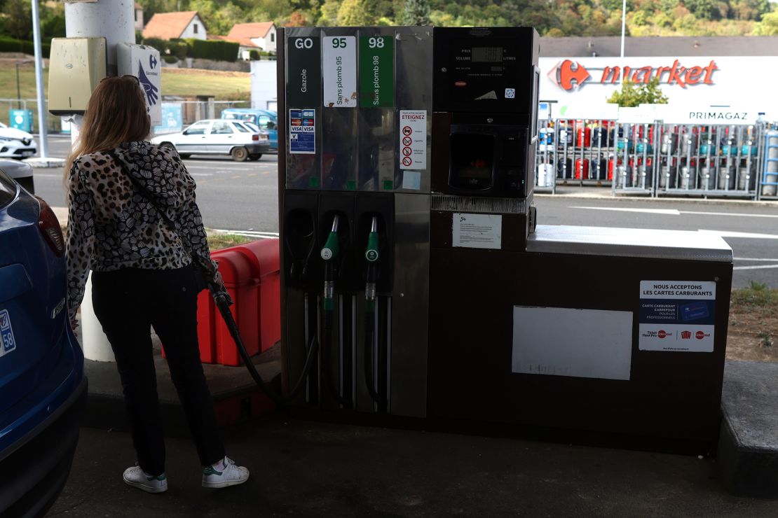 A motorist fills her car at a petrol station at Carrefour hypermarket in Premery, France on September 19, 2023.
