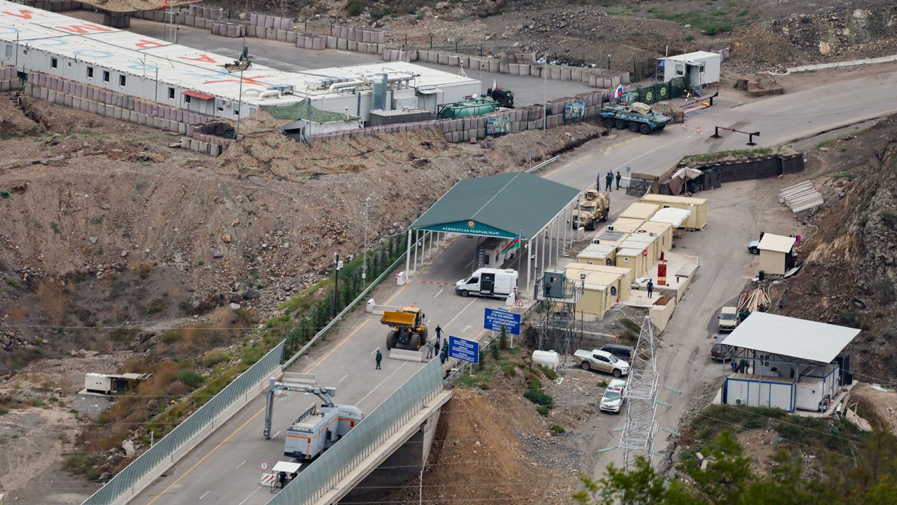 This photograph taken from the Armenian side of the border near the town of Kornidzor, on September 23, 2023, shows a general view of the Hakari bridge and the Azerbaijani checkpoint set up at the entry of the Lachin corridor, in Azerbaijan's controlled region of Nagorno-Karabakh. Nagorno-Karabakh separatists were expected to lay down their arms on September 23, 2023, under an agreement reached with the Azerbaijan government following its lightning offensive. (Photo by Alain JOCARD / AFP) (Photo by ALAIN JOCARD/AFP via Getty Images)