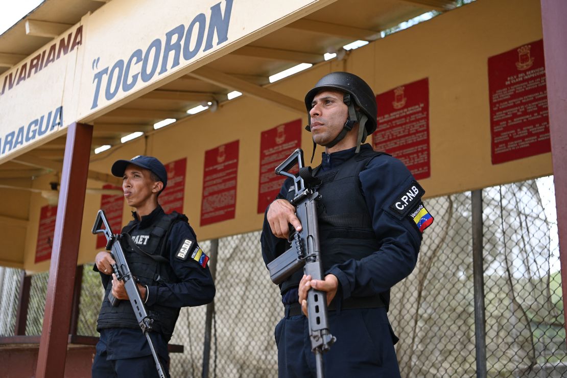 Members of the Bolivarian National Police stand guard in the Tocorón prison in Tocorón, Aragua state, Venezuela, on September 23, 2023. Gang leaders who ruled a prison in Venezuela that was stormed by more than 11,000 soldiers and police had fled the country a week before the operation, a prisoners' rights group said.