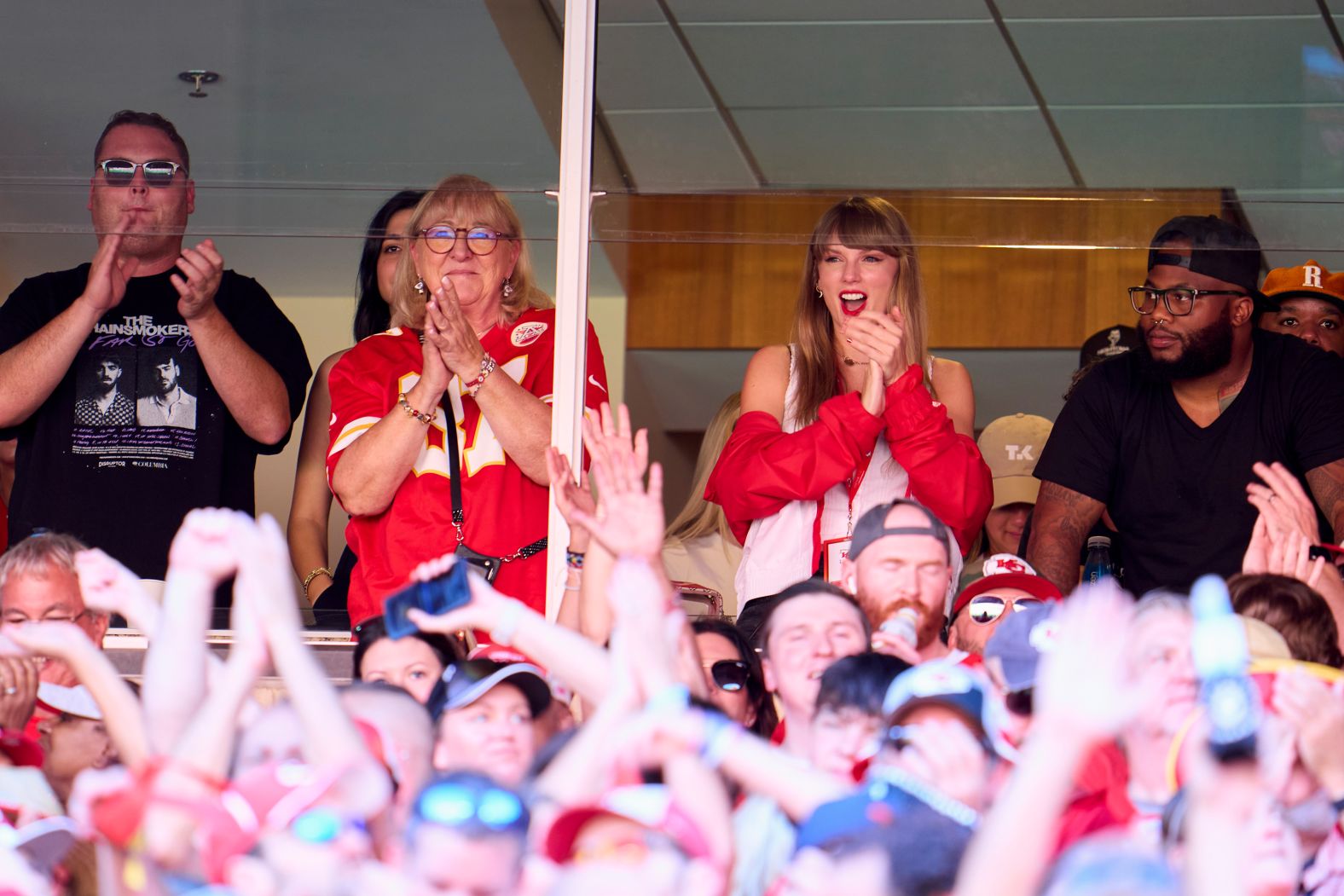 Swift reacts during a Chiefs game in September 2023. Her appearance alongside Donna Kelce came after weeks of speculation that she and Travis were dating.