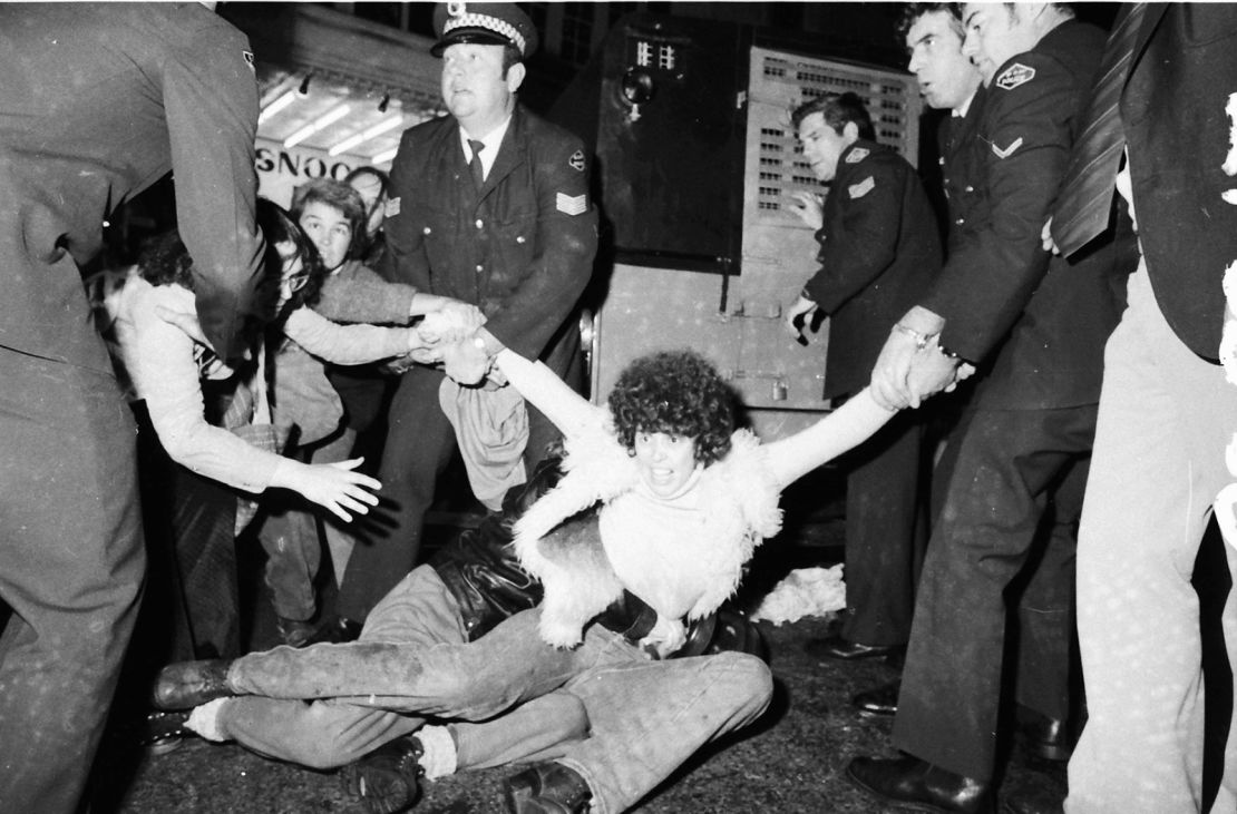 Protestors calling for gay and lesbian rights clash with police officers during the Mardi Gras march on Oxford Street in Sydney on International Homosexual Solidarity Day on June 24, 1978.