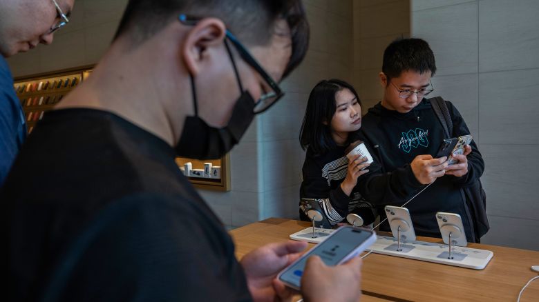 People look at the newly launched iPhone 15 at a flagship store in Beijing, China on September 22, 2023.