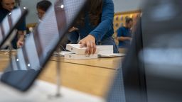 A customer purchases an iPhone 15 on September 22, 2023 in Milan, Italy.