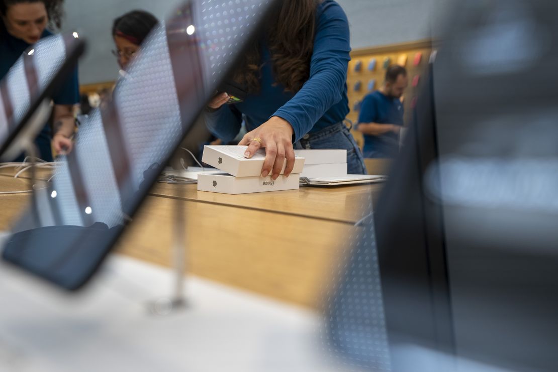 A customer purchases an iPhone 15 on September 22, 2023 in Milan, Italy.