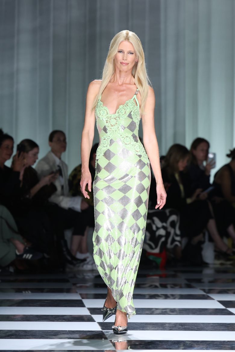 ... including the womenswear spring-summer 2024 season at Milan Fashion Week, worn by Claudia Schiffer on the runway.