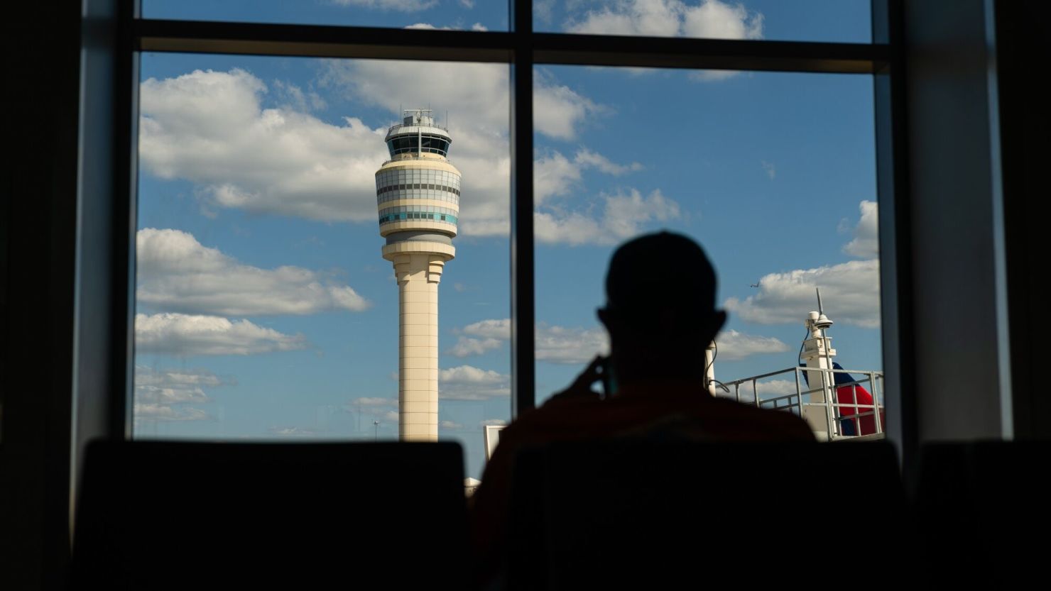 The air traffic control tower at Hartsfield-Jackson Atlanta International Airport in Atlanta, Georgia, on Oct. 2, 2023. The FAA is facing a shortage in air traffic controllers, who are forced to work overtime.