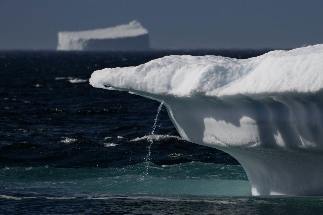 Flowing water from melting ice in Scoresby Fjord, Greenland, in August 12, 2023.