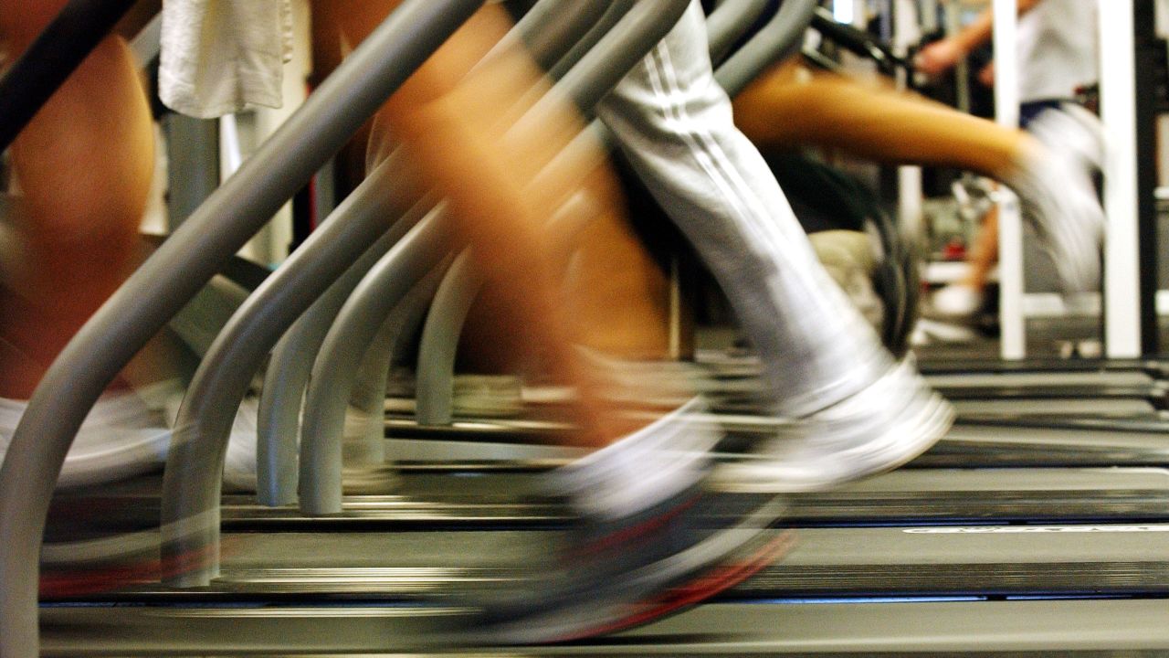 BROOKLYN, NEW YORK - JANUARY 2: People run on treills at a New York Sports Club January 2, 2003 in Brooklyn, New York. Thousands of people around the country health clubs in the first week of the new year as part of their New Year's resolution. Many health clubs see a surge in business of 25 percent immediately after the new year, only to see those numbers level off by spring. (Photo by Spencer Platt/Getty Images)