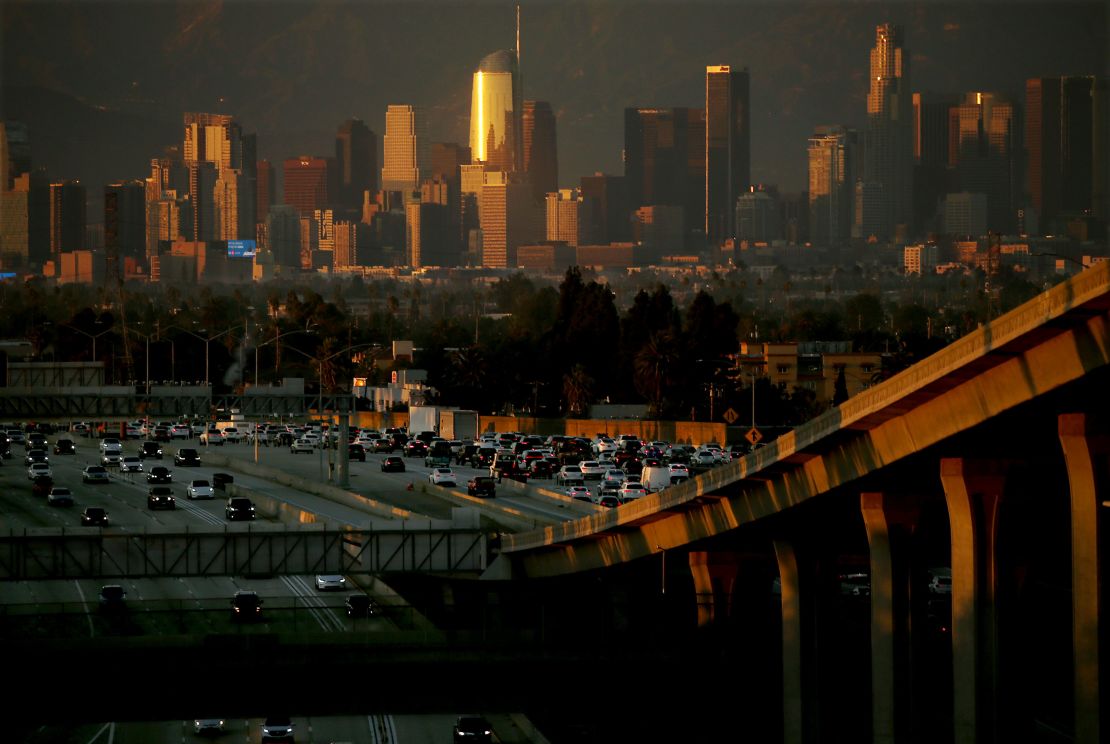 Smog hangs in the air as the sun sets after a hot day in the Los Angeles Basin on October 4, 2023.