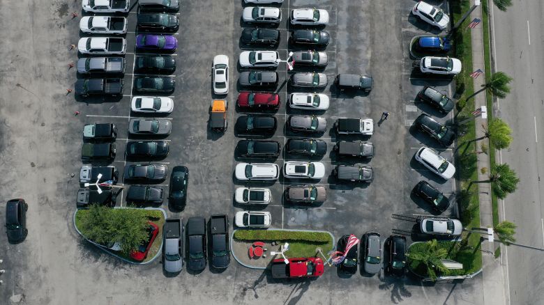 In an aerial view, new vehicles sit on a Dodge Chrysler-Jeep Ram dealership's lot on October 03, 2023 in Miami, Florida.