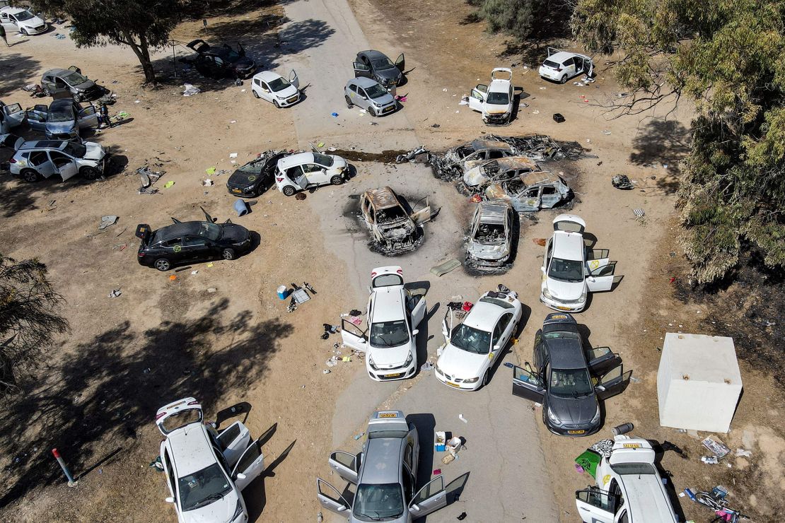 This aerial picture shows abandoned and torched vehicles at the site of the October 7 attack on a music festival in southern Israel on October 13, 2023.