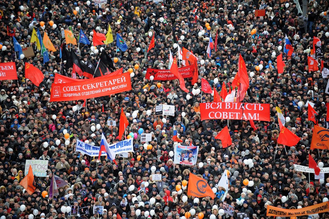 Thousands of people protest against the parliament elections in Moscow, on December 24, 2011.