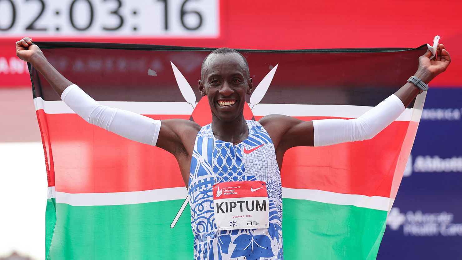 Kelvin Kiptum celebrates after winning the 2023 Chicago Marathon professional men's division and setting a world record marathon time of 2:00.35 at Grant Park on October 8, 2023 in Chicago, Illinois.
