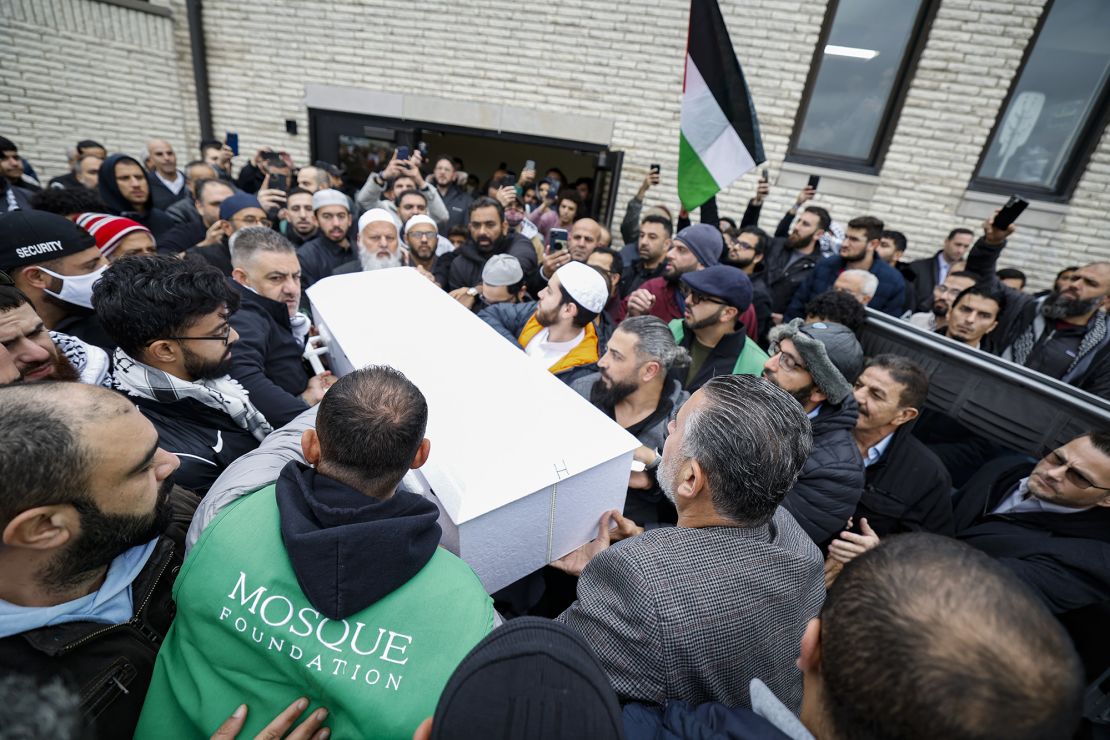 The mourners carry the label of Wadoe Alfayoumi, 6, after their funeral at the Mosque Foundation in Bridgeview, Illinois, on October 16, 2023.