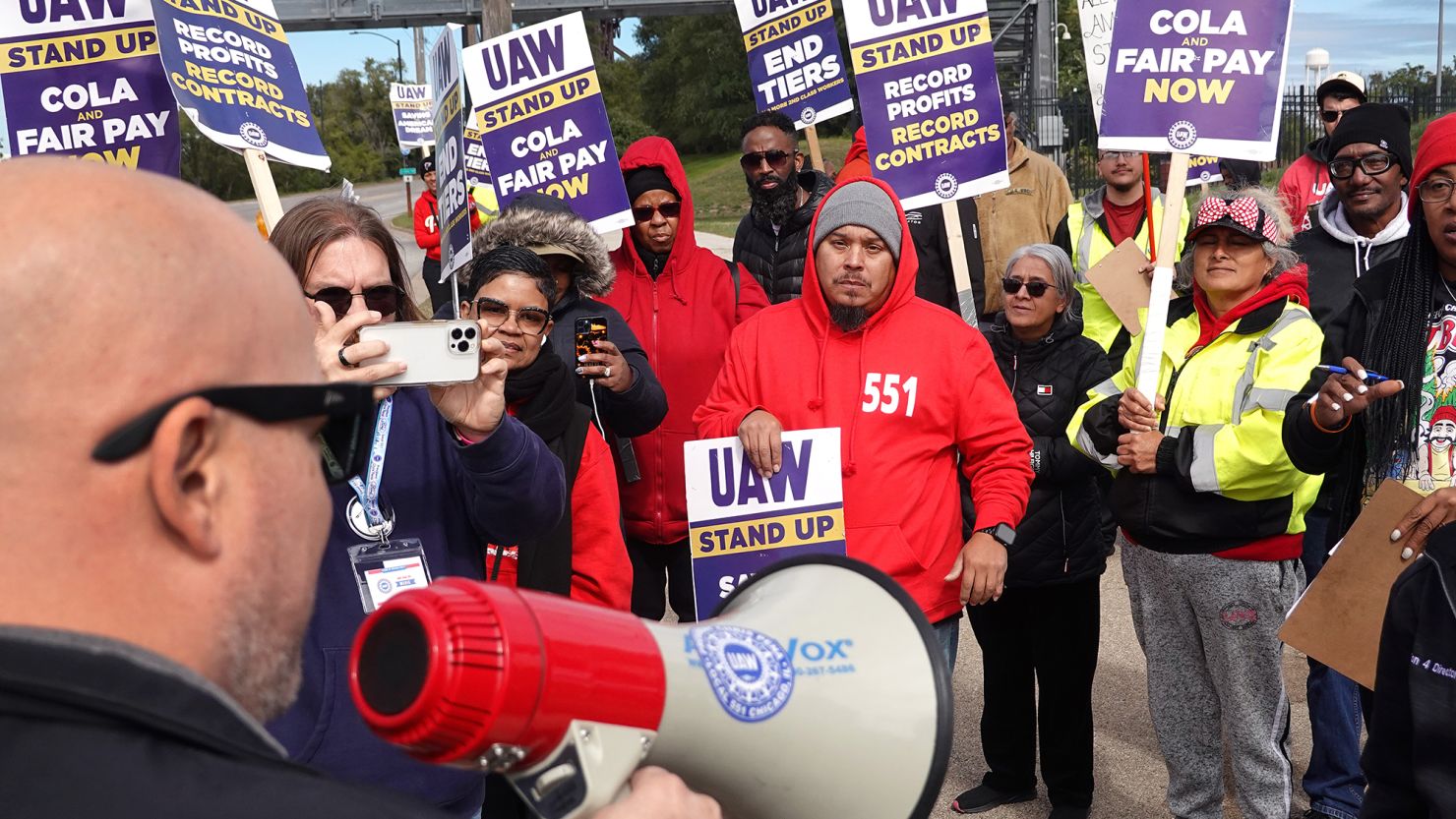 Workers picket outside of the Ford Assembly plant last month during the UAW strike against the Big Three U.S. automakers.