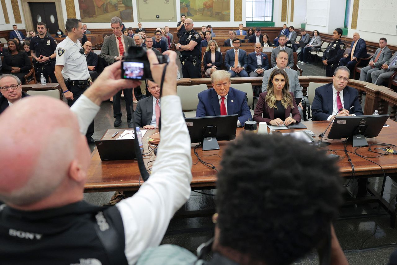 Former US President Donald Trump sits inside the courtroom during his civil fraud trial in New York City on October 17, 2023.