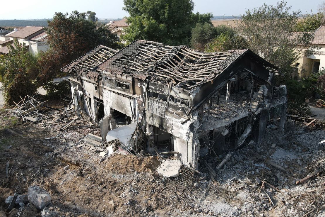 An aerial photo shows a damaged building in kibbutz Be'eri on October 22, 2023