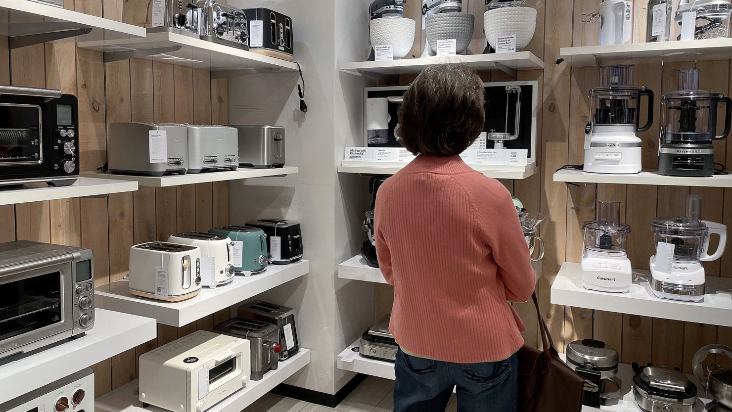 A customer shops at a Crate and Barrel store on October 17, 2023 in Corte Madera, California.