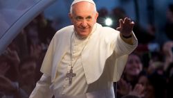 RIO DE JANEIRO, BRAZIL - JULY 26: Pope Francis waves from the Popemobile on his way to attend the Via Crucis on Copacabana Beach during World Youth Day celebrations on July 26, 2013 in Rio de Janeiro, Brazil. More than 1.5 million pilgrims are expected to the pontiff for his visit to the Catholic Church's World Youth Day celebrations which is running July 23-28. (Photo by Buda Mendes/Getty Images)