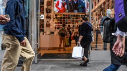 Shoppers in the Times Square neighborhood of New York, US, on Friday, Oct. 27, 2023. The US economy grew at the fastest pace in nearly two years last quarter on a burst of consumer spending, which will be tested in coming months.