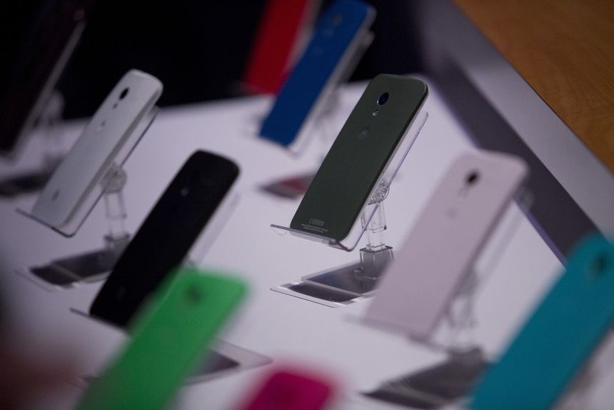 The Motorola Mobility Moto X phone is displayed during a launch event in New York on August 1, 2013.