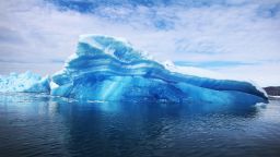QAQORTOQ, GREENLAND - JULY 30:  Calved icebergs from the nearby Twin Glaciers are seen floating on the water on July 30, 2013 in Qaqortoq, Greenland. Boats are a crucial mode of transportation in the country that has few roads. As cities like Miami, New York and other vulnerable spots around the world strategize about how to respond to climate change, many Greenlanders simply do what theyve always done: adapt.  "Were used to change, said Greenlander Pilu Neilsen. "We learn to adapt to whatever comes. If all the glaciers melt, well just get more land.  (Photo by Joe Raedle/Getty Images)