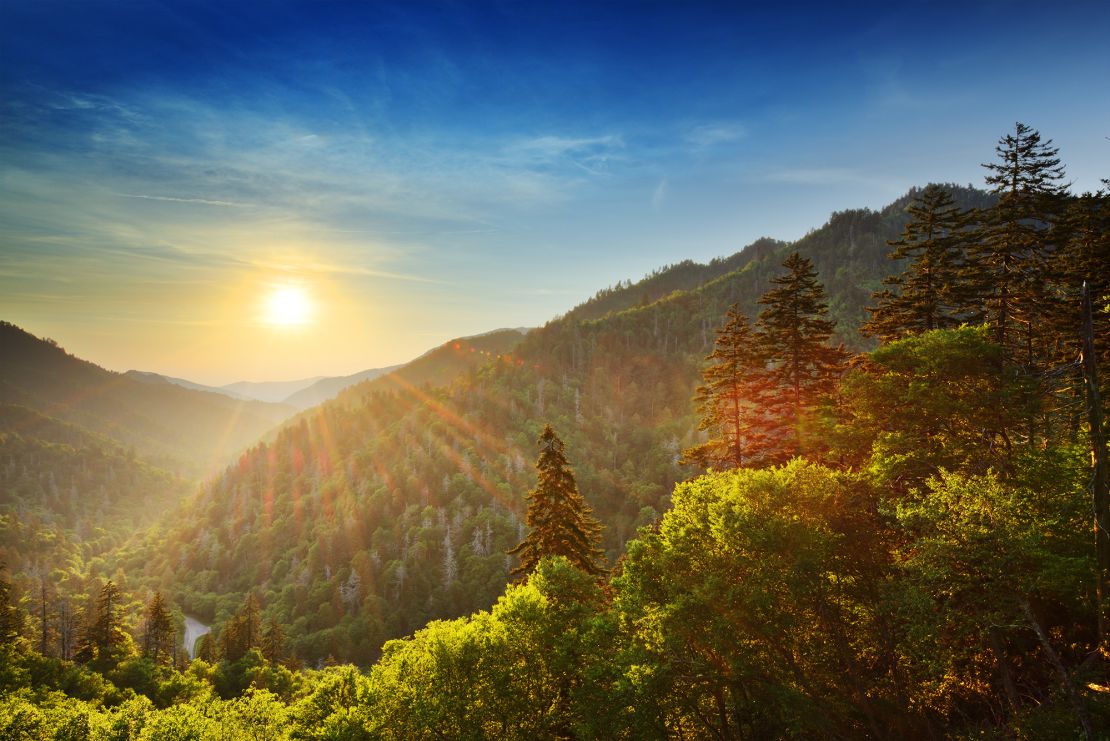 The sun sets in Newfound Gap at the Tennessee-North Carolina line. The area is part of the Great Smoky Mountains National Park and is known for having much cooler temperatures than surrounding lowlands.