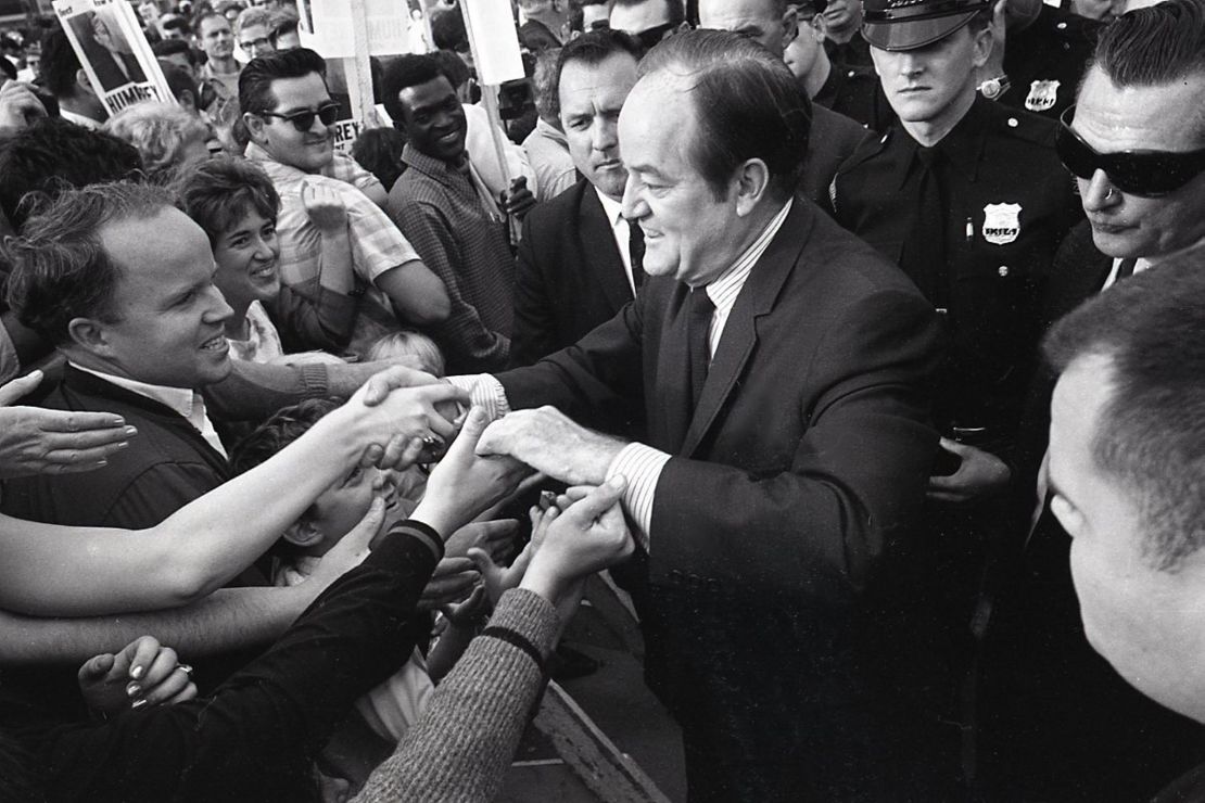 Vice President Hubert H. Humphrey shakes hands with supporters at MacArthur Airport in Bohemia, New York during a campaign rally on November 2, 1968.