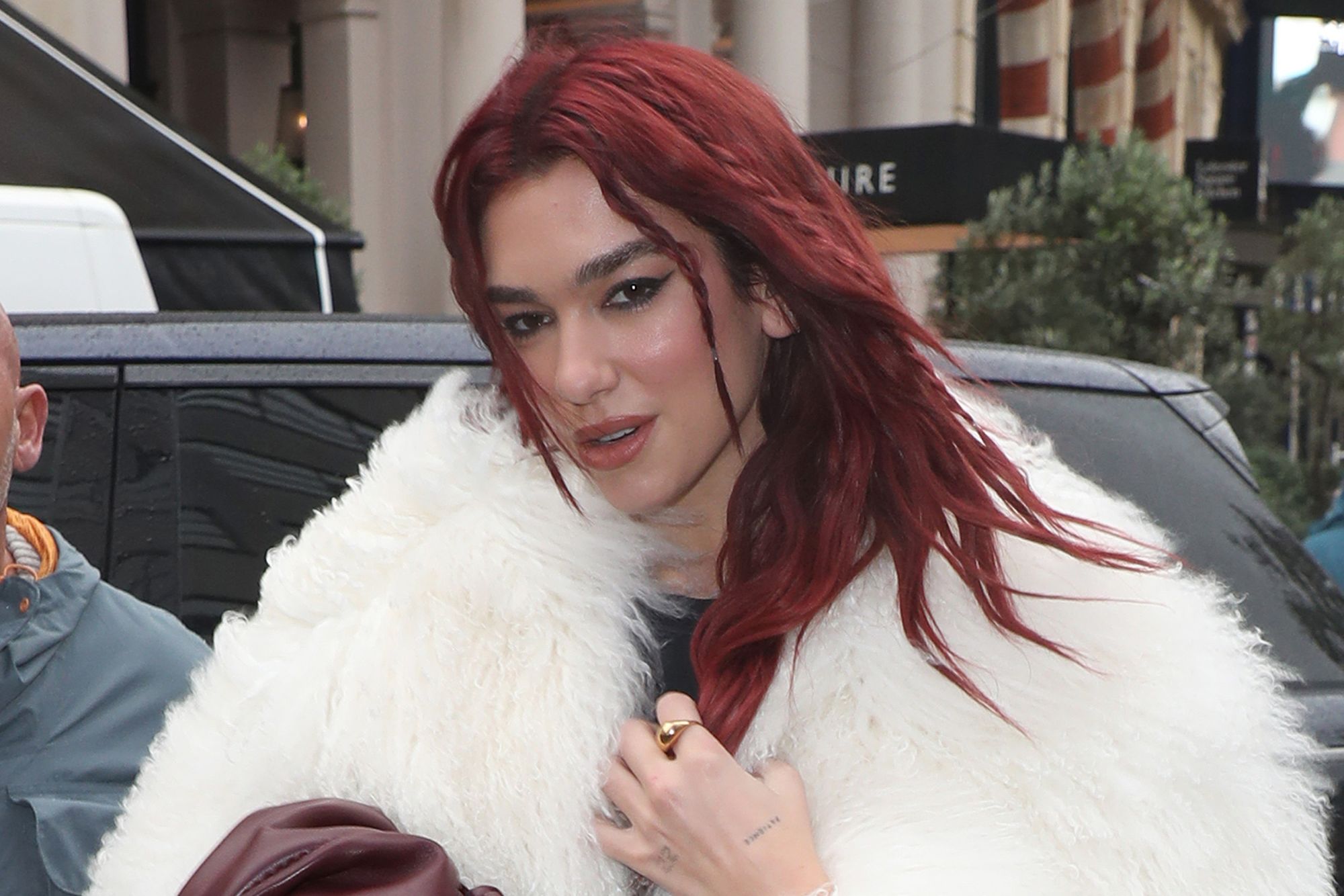 Dua Lipa is the latest celebrity to debut cherry-colored tresses this autumn.