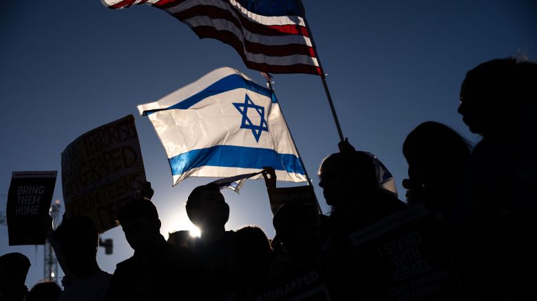 In this November 14 photo, people attend the March for Israel on the National Mall in Washington, DC.