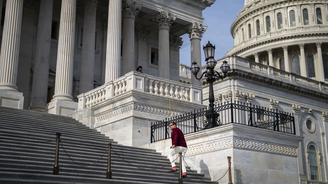 Rep. George Santos arrives for a vote at the US Capitol in Washington, DC, on Wednesday, November 15.