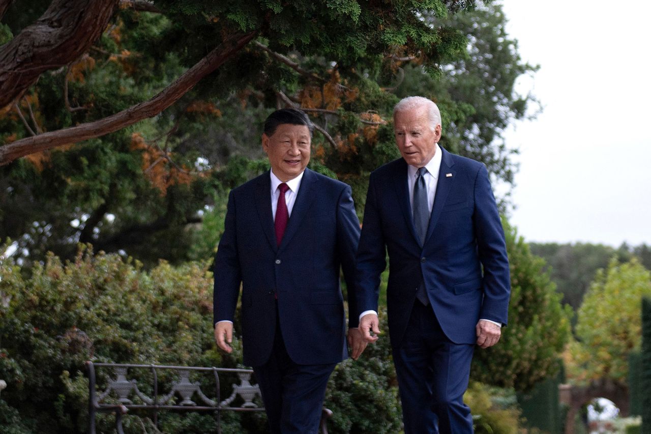 President Joe Biden and Chinese President Xi Jinping walk together after a meeting during the Asia-Pacific Economic Cooperation (APEC) Leaders' week in Woodside, California on November 15, 2023.