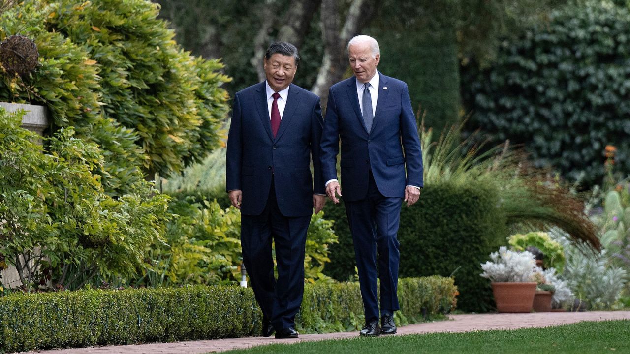 US President Joe Biden (R) and Chinese President Xi Jinping walk together after a meeting during the Asia-Pacific Economic Cooperation (APEC) Leaders' week in Woodside, California on November 15, 2023. Biden and Xi will try to prevent the superpowers' rivalry spilling into conflict when they meet for the first time in a year at a high-stakes summit in San Francisco on Wednesday. With tensions soaring over issues including Taiwan, sanctions and trade, the leaders of the world's largest economies are expected to hold at least three hours of talks at the Filoli country estate on the city's outskirts.
