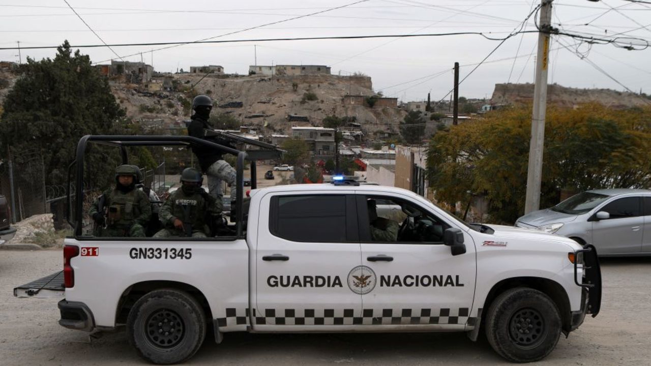 Members of the National Guard patrol the area where photojournalist Ismael Villagomez Tapia was murdered in Ciudad Juarez, state of Chihuahua, Mexico, on November 16, 2023. Ismael Villagomez Tapia, a photojournalist for El Heraldo de Juarez, was shot in the face and killed Thursday in this border town with the US city of El Paso, local authorities reported. (Photo by HERIKA MARTINEZ / AFP) (Photo by HERIKA MARTINEZ/AFP via Getty Images)