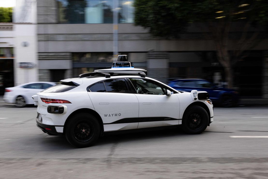 A Waymo autonomous vehicle turning onto Mission Street in San Francisco in November 2023.