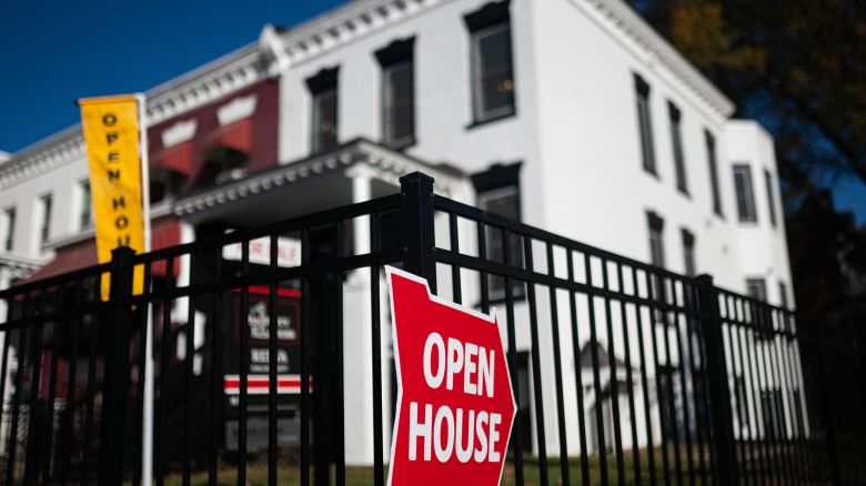 An "Open House" sign outside of a home in Washington, DC, US, on Sunday, Nov. 19, 2023.