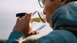 Staying hydrated. Going on an adventure and exploring nature. Healthy and active lifestyle.